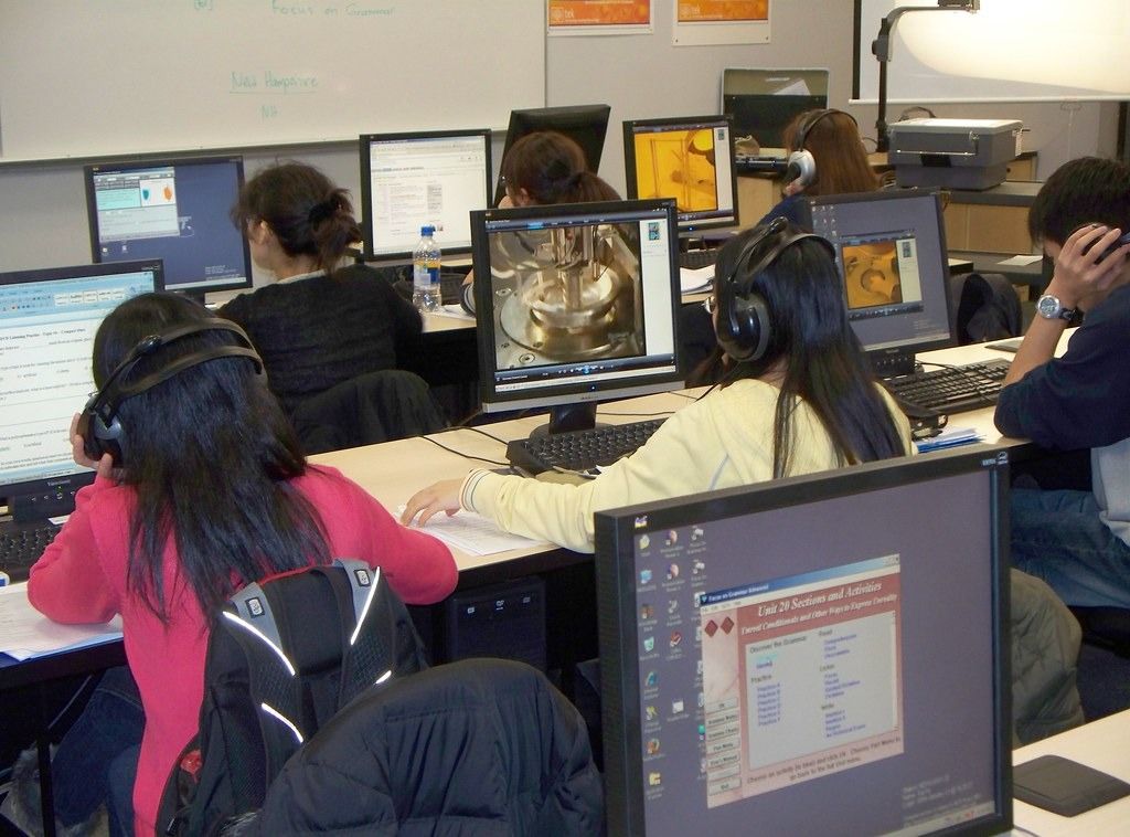 Students working at desktop computers in a training lab