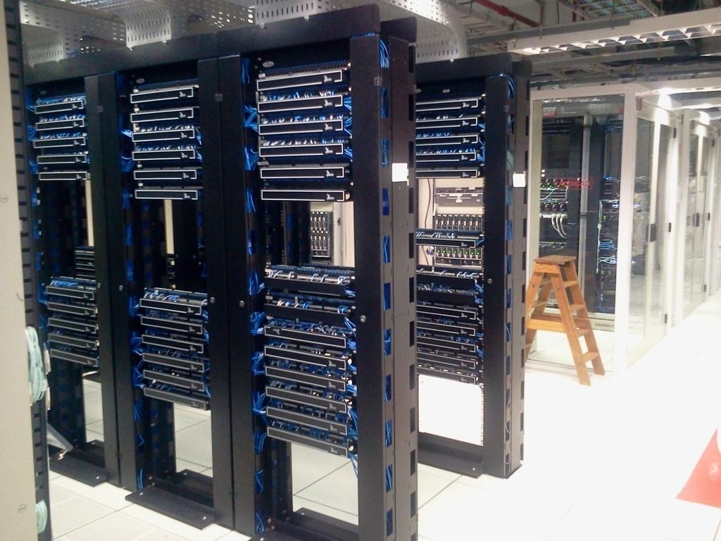 Engineer's view down a row of server cabinets